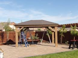 Handyman assembling backyard gazebo in Atlanta GA